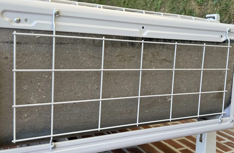 a Dirty HVAC Coil with white grate