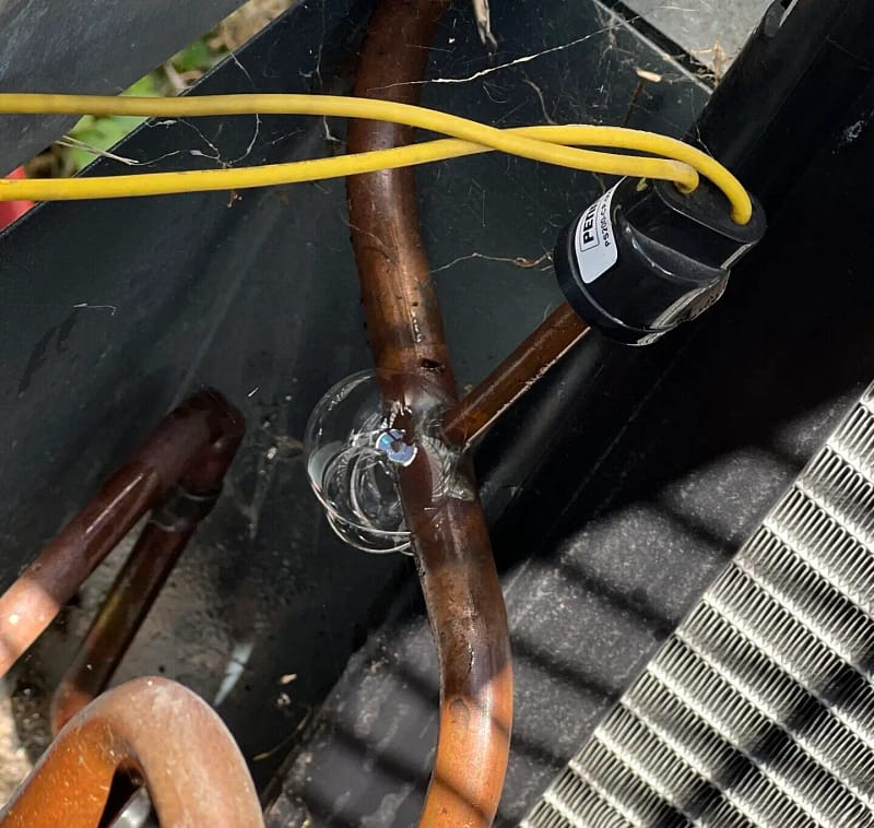 a close up of a leaking pipe